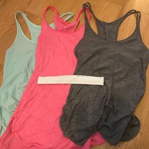three lululemon tank tops and one headband